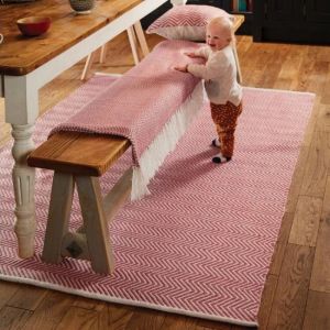 Hug Rug Woven Herringbone Coral Pink Rug